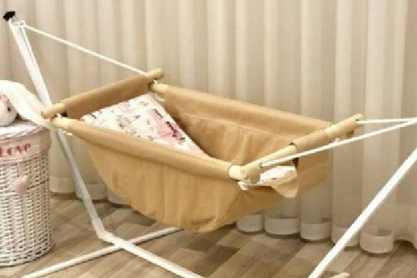 انتخاب ایده‌آل گهواره پارچه‌ای برای تزئین اتاق نوزاد