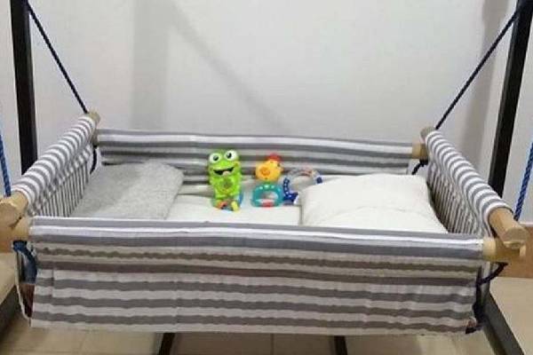 گهواره پارچه‌ای زیبایی و رنگارنگی برای فضای شاد و سرزنده